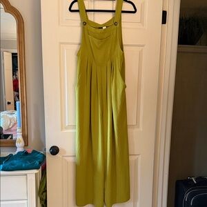 Sleeveless Olive Green Wide-Leg Jumpsuit with Button-Strap Detail